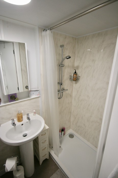 Shower within an L shape granny annexe 